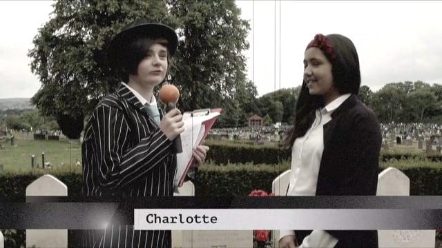 Victoria C.P School go back in time to present the news from Wrexham Cemetery.